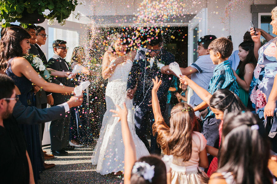 Confetti send-off as the couple exits a venue
